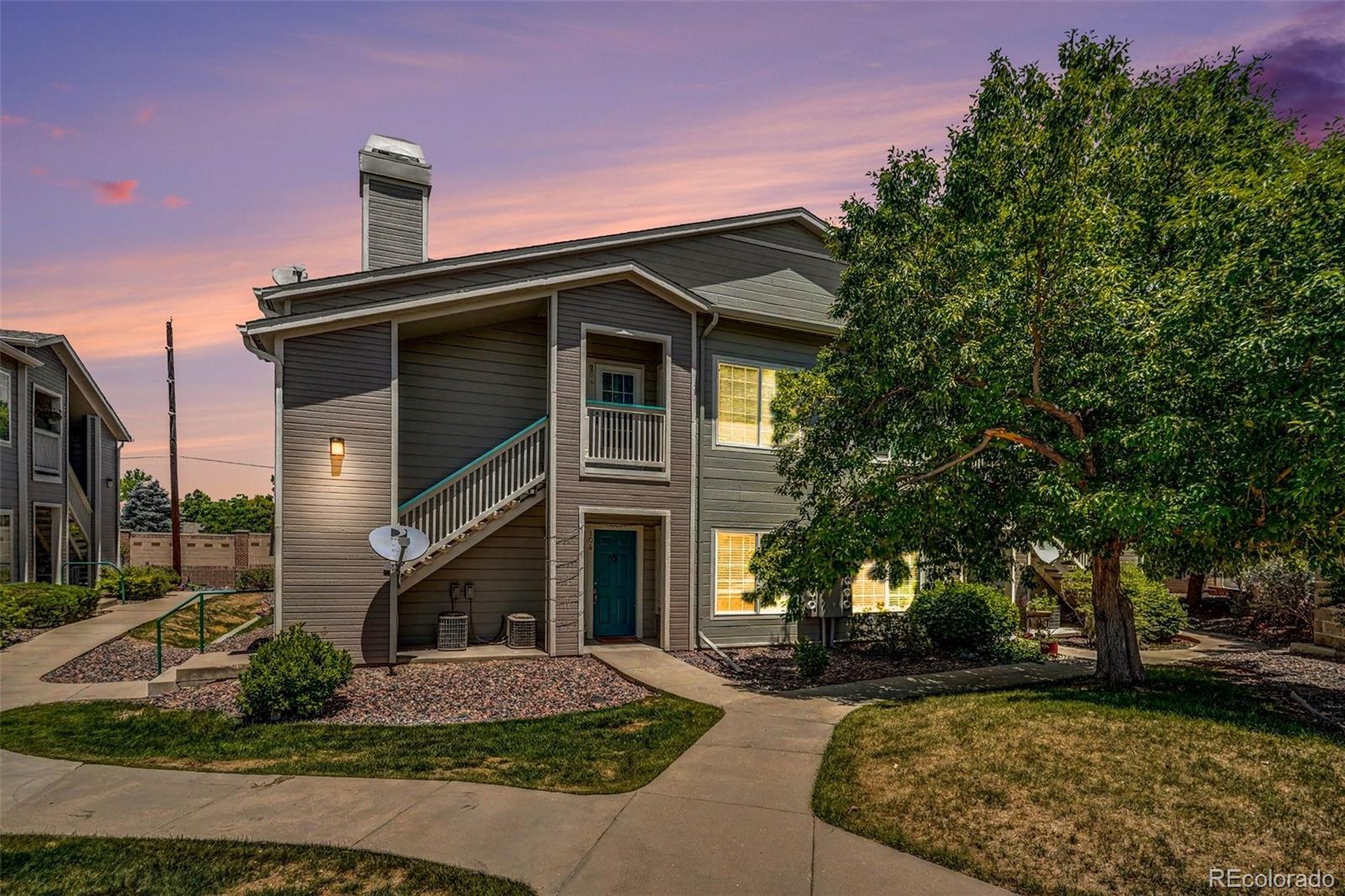 8365 Pebble Creek Way, Unit 201 Highlands Ranch, CO 80126 - Photo 1 of 26