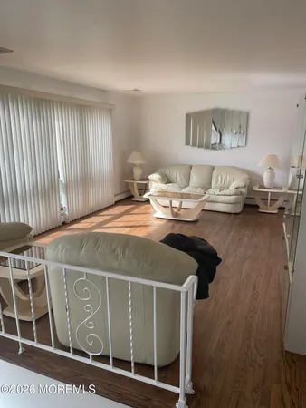 a dining room with a table and chairs