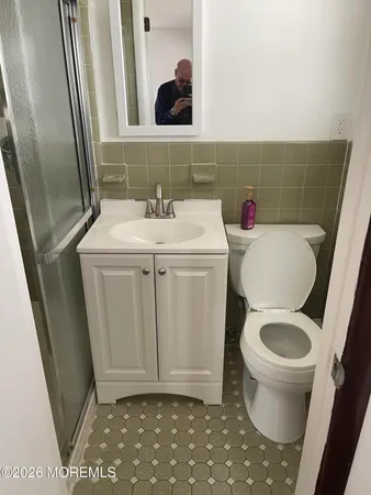 a bathroom with a sink and a toilet