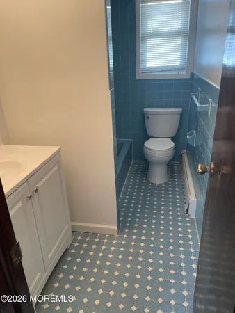 a bathroom with a toilet