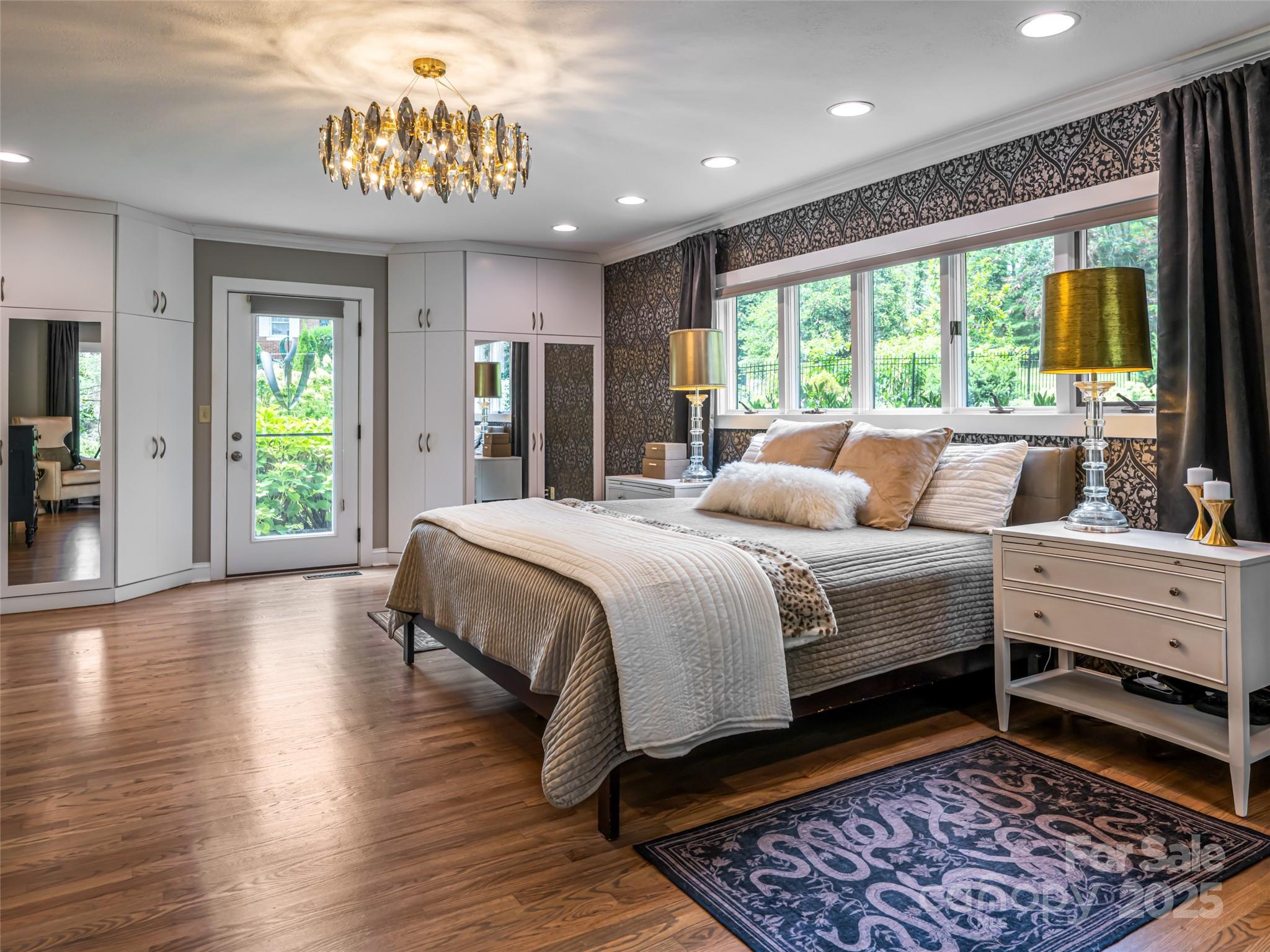 5 Busbee Road Asheville, NC 28803 - Photo 15 of 48 a bedroom with a large bed and a window