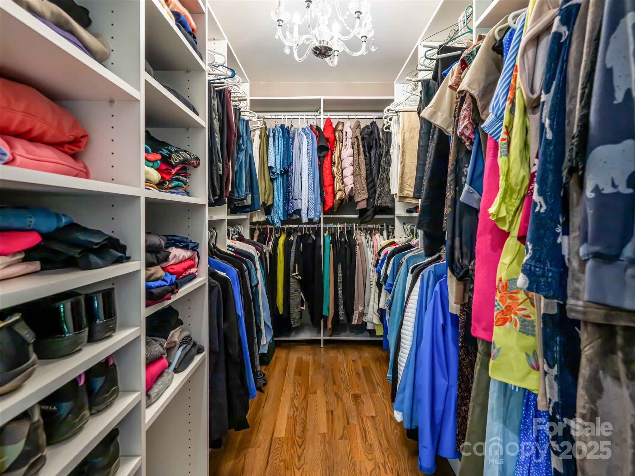 5 Busbee Road Asheville, NC 28803 - Photo 18 of 48 a view of walk in closet with clothes and shoes