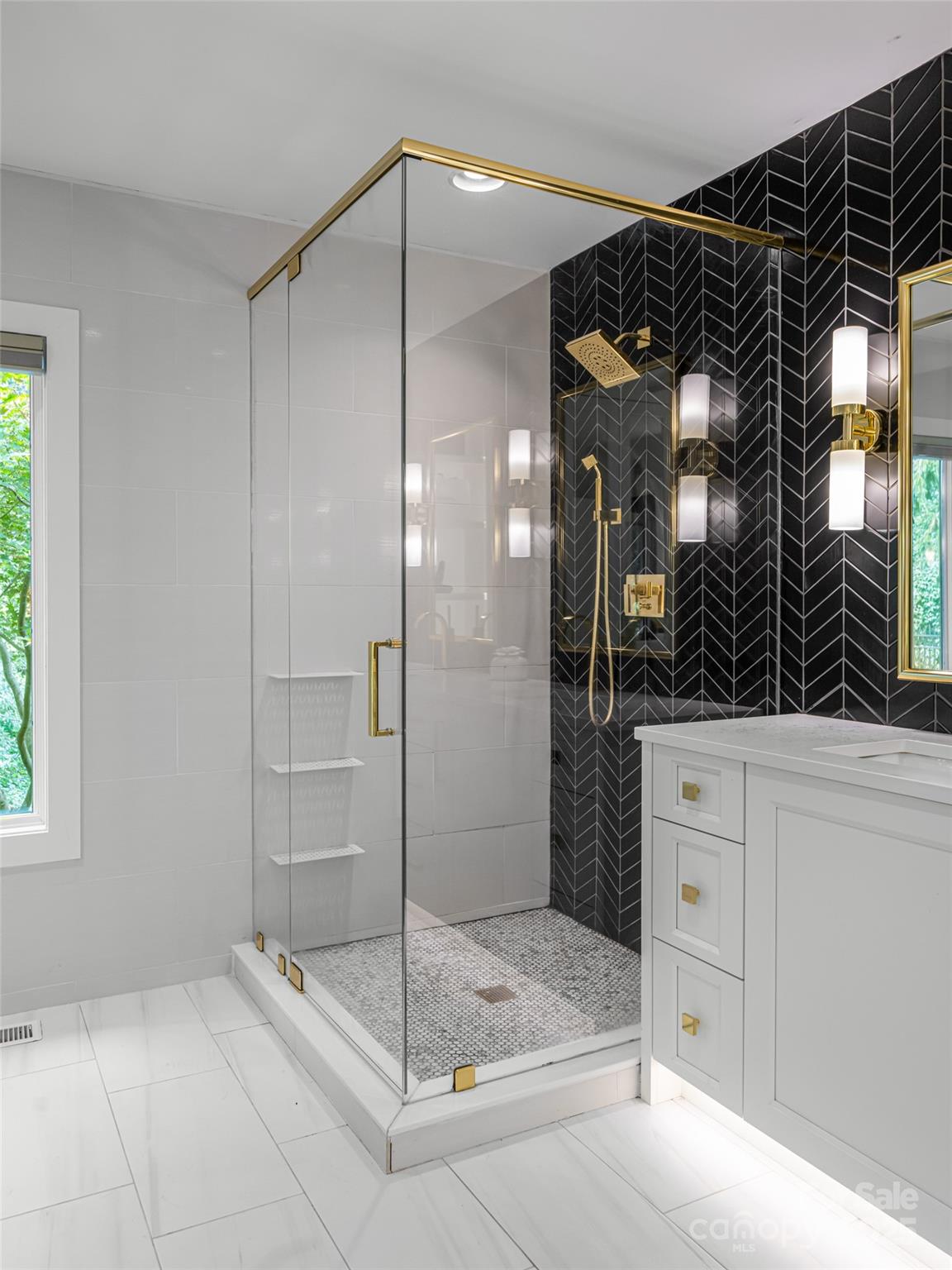 5 Busbee Road Asheville, NC 28803 - Photo 21 of 48 a bathroom with a shower and a sink