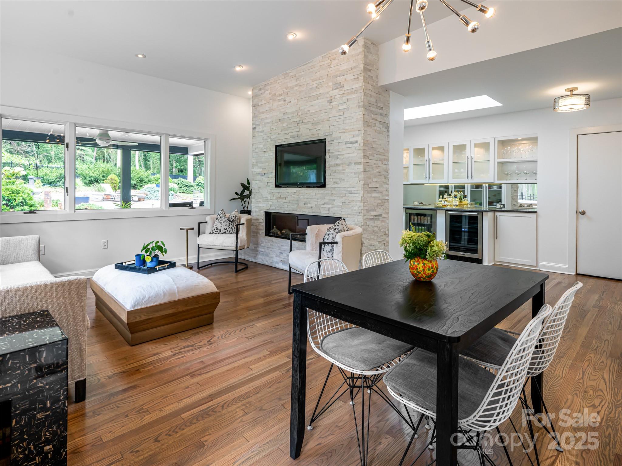 5 Busbee Road Asheville, NC 28803 - Photo 23 of 48 a view of a dining room with furniture and a window