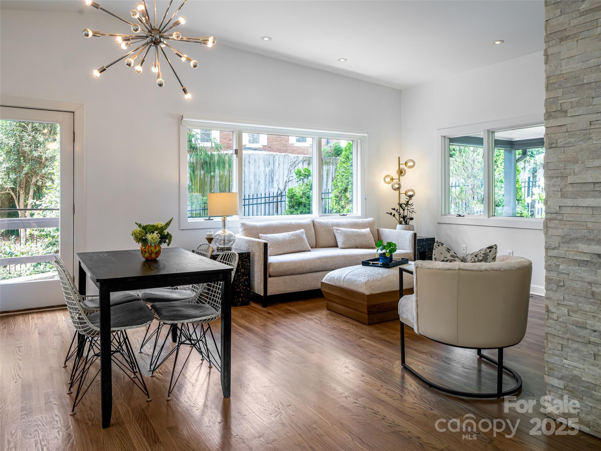 5 Busbee Road Asheville, NC 28803 - Photo 25 of 48 a living room with furniture and a window