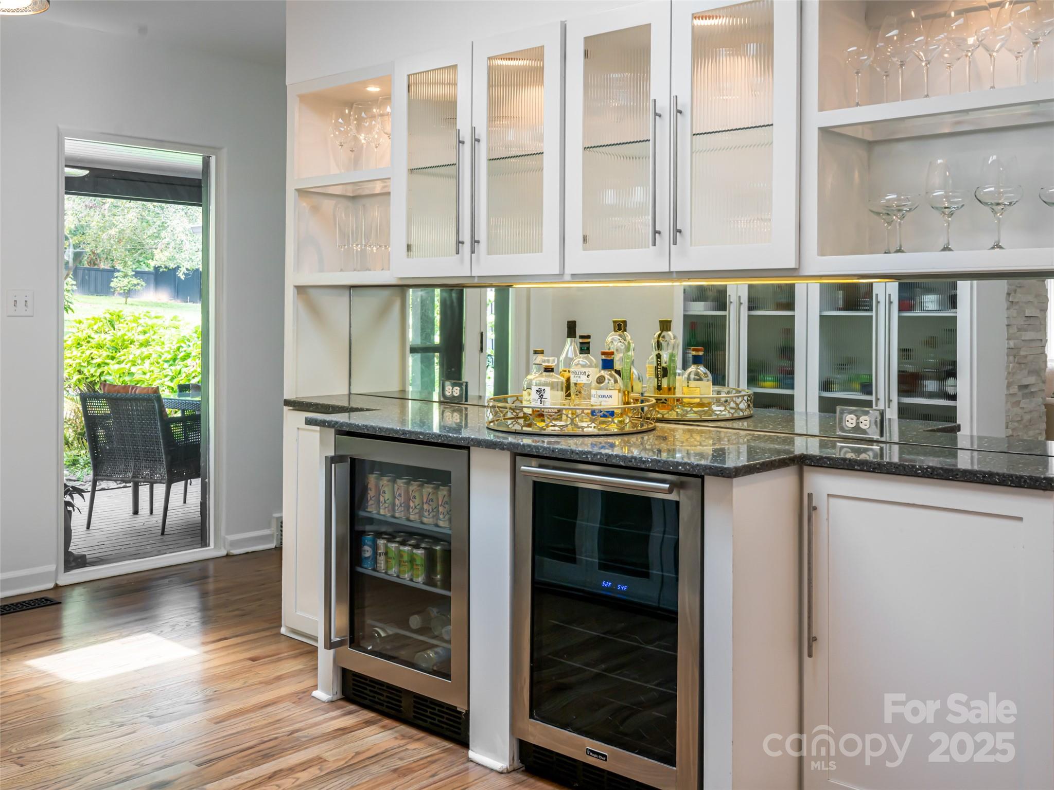 5 Busbee Road Asheville, NC 28803 - Photo 27 of 48 a kitchen with granite countertop a stove and a white cabinets