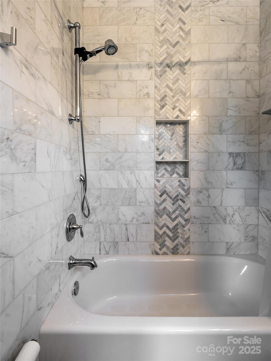 5 Busbee Road Asheville, NC 28803 - Photo 37 of 48 a bathroom with a bathtub
