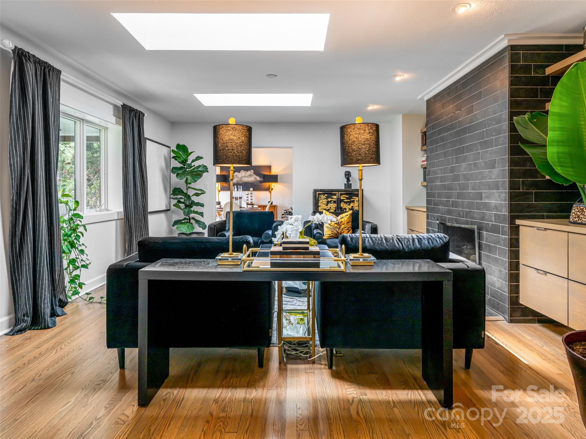 5 Busbee Road Asheville, NC 28803 - Photo 5 of 48 a view of a workspace with furniture