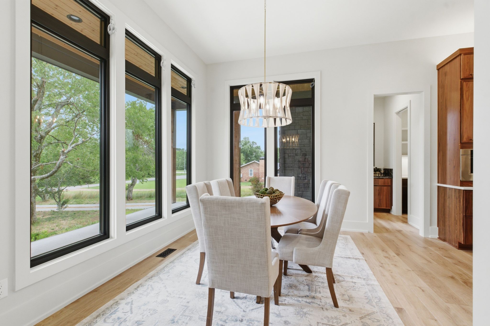 1002 Waller Road Brentwood, TN 37027 - Photo 7 of 54 a dining room with furniture window and wooden floor