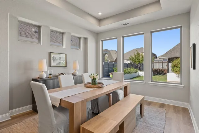 a stove top oven sitting inside of a kitchen