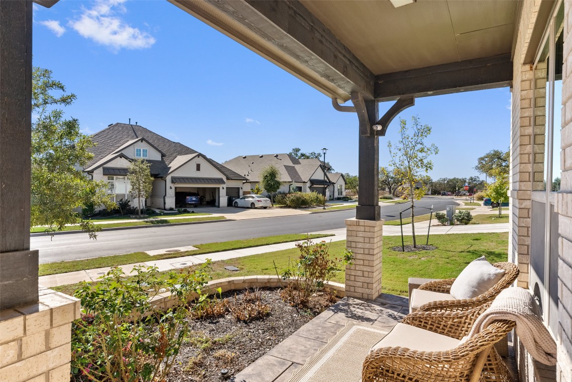 1017 Highcrest Georgetown, TX 78628 - Photo 2 of 40 a view of swimming pool with lawn chairs and a yard