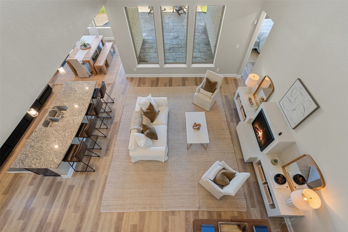 1017 Highcrest Georgetown, TX 78628 - Photo 30 of 40 wooden floor with white walls and cabinets