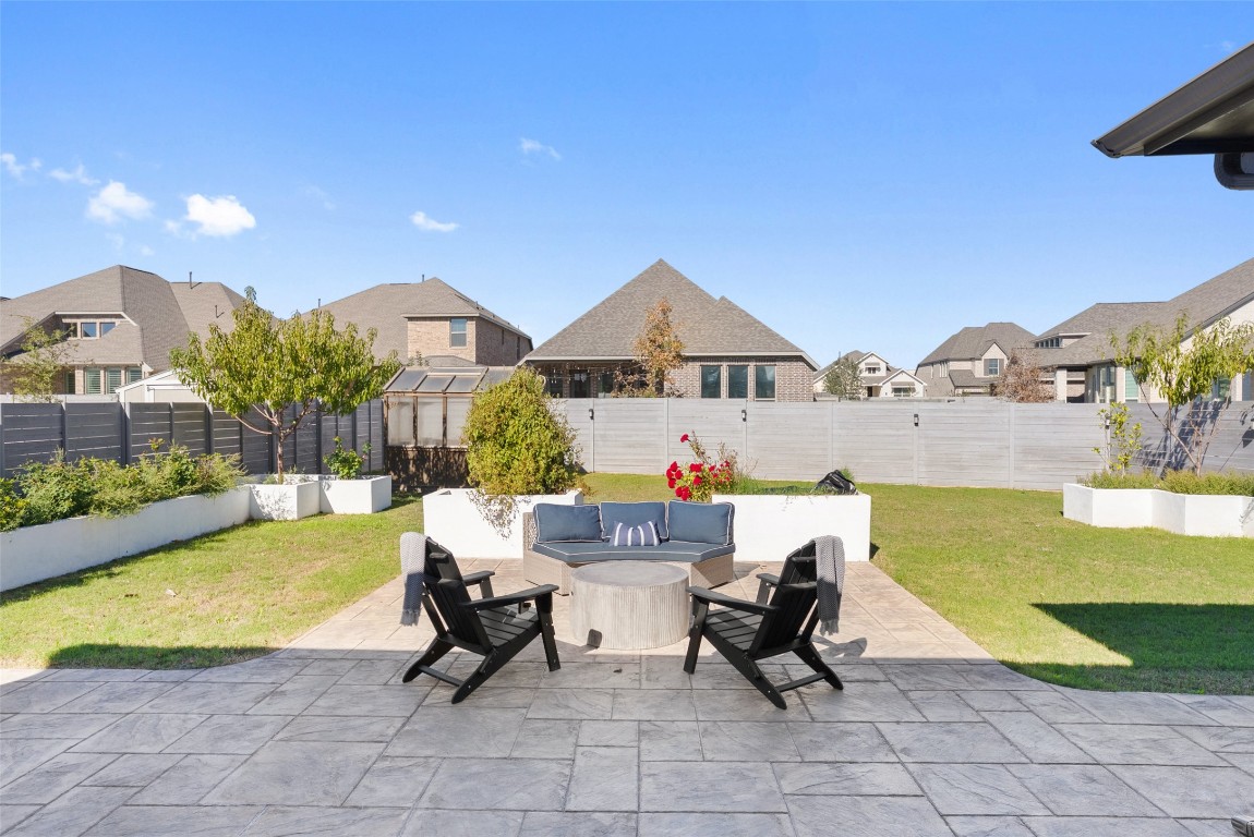 1017 Highcrest Georgetown, TX 78628 - Photo 4 of 40 a swimming pool with outdoor seating and yard