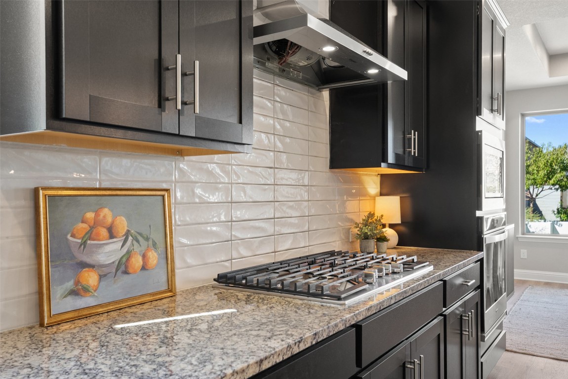1017 Highcrest Georgetown, TX 78628 - Photo 9 of 40 a stove top oven sitting inside of a kitchen