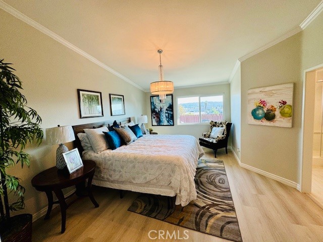 194 Amberwood Drive Walnut, CA 91789 - Photo 16 of 63 a bedroom with furniture and a chandelier