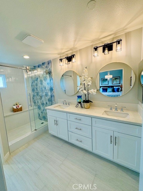 194 Amberwood Drive Walnut, CA 91789 - Photo 19 of 63 a spacious bathroom with a double vanity sink and a mirror