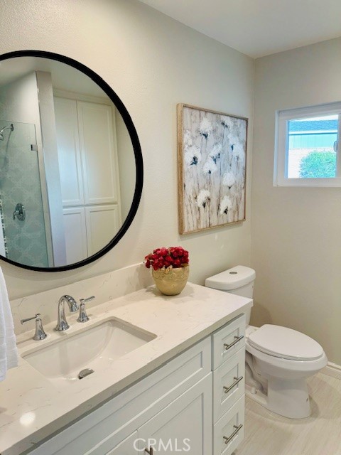 194 Amberwood Drive Walnut, CA 91789 - Photo 35 of 63 a bathroom with a sink a mirror and toilet