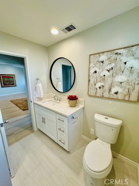 194 Amberwood Drive Walnut, CA 91789 - Photo 36 of 63 a bathroom with a toilet sink vanity granite and a shower