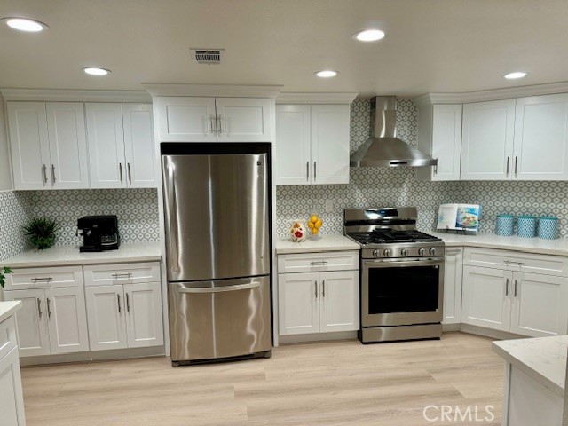 194 Amberwood Drive Walnut, CA 91789 - Photo 51 of 63 a kitchen with stainless steel appliances a refrigerator stove and sink