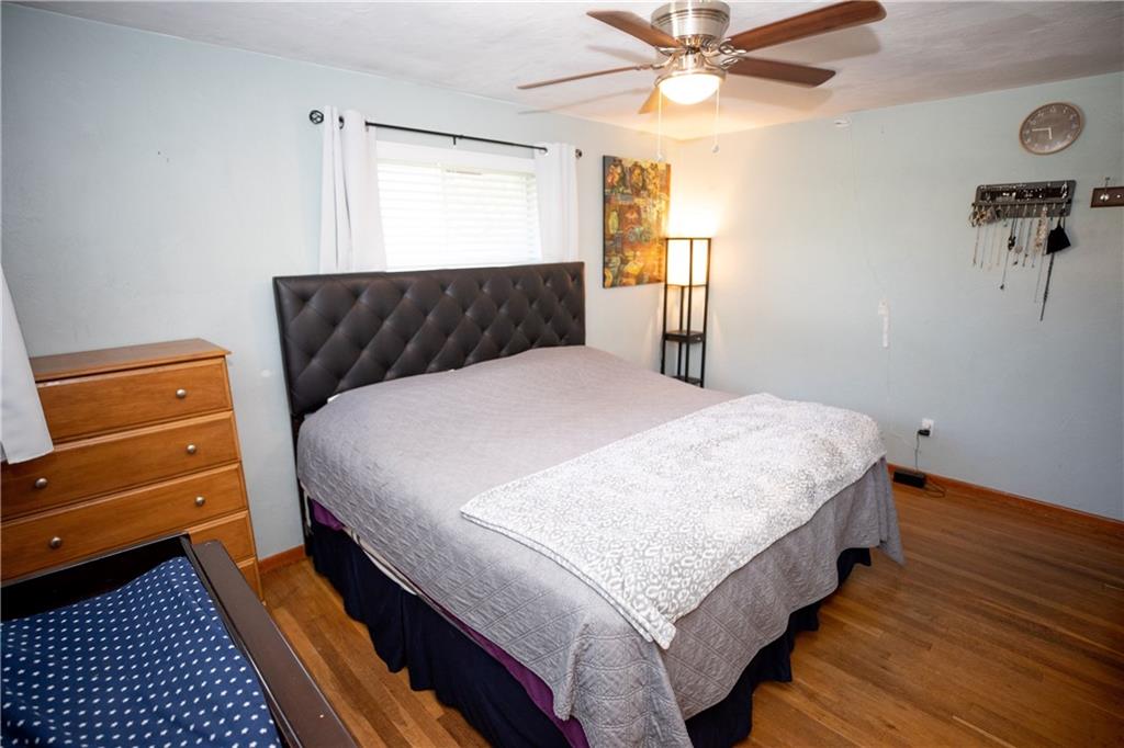 133 Church Road Pittsburgh, PA 15209 - Photo 15 of 20 a bedroom with a bed and a dresser