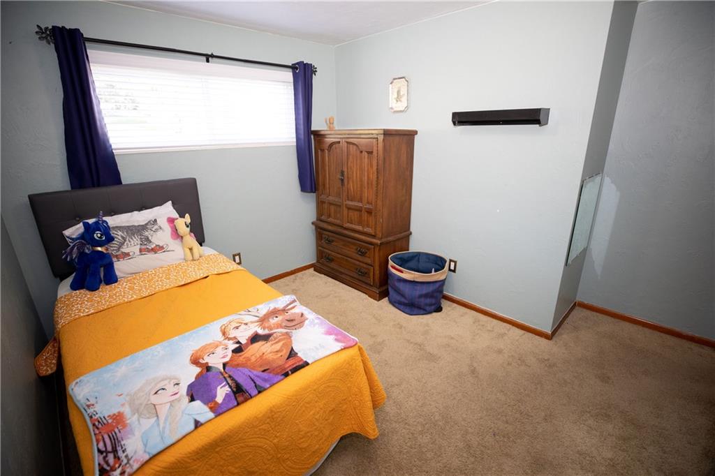 133 Church Road Pittsburgh, PA 15209 - Photo 19 of 20 a bedroom with a bed and a window
