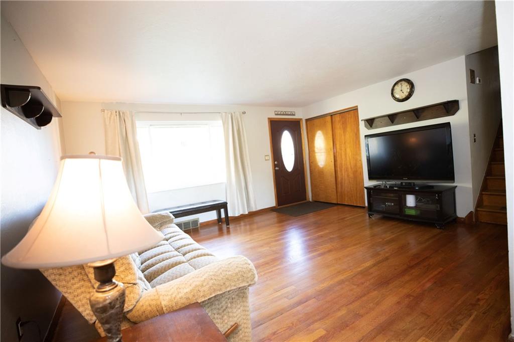 133 Church Road Pittsburgh, PA 15209 - Photo 5 of 20 a living room with furniture and a flat screen tv