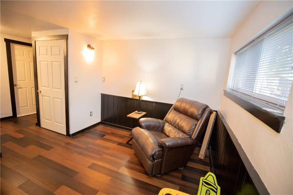 133 Church Road Pittsburgh, PA 15209 - Photo 9 of 20 a living room with furniture and wooden floor