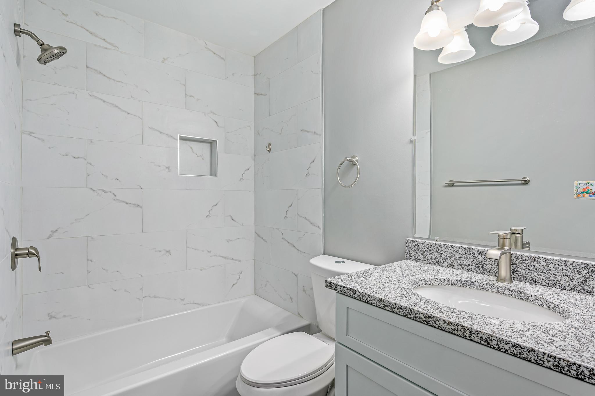 21012 Timber Ridge Terrace, Unit 101 Ashburn, VA 20147 - Photo 17 of 29 Remodeled Primary Bathroom