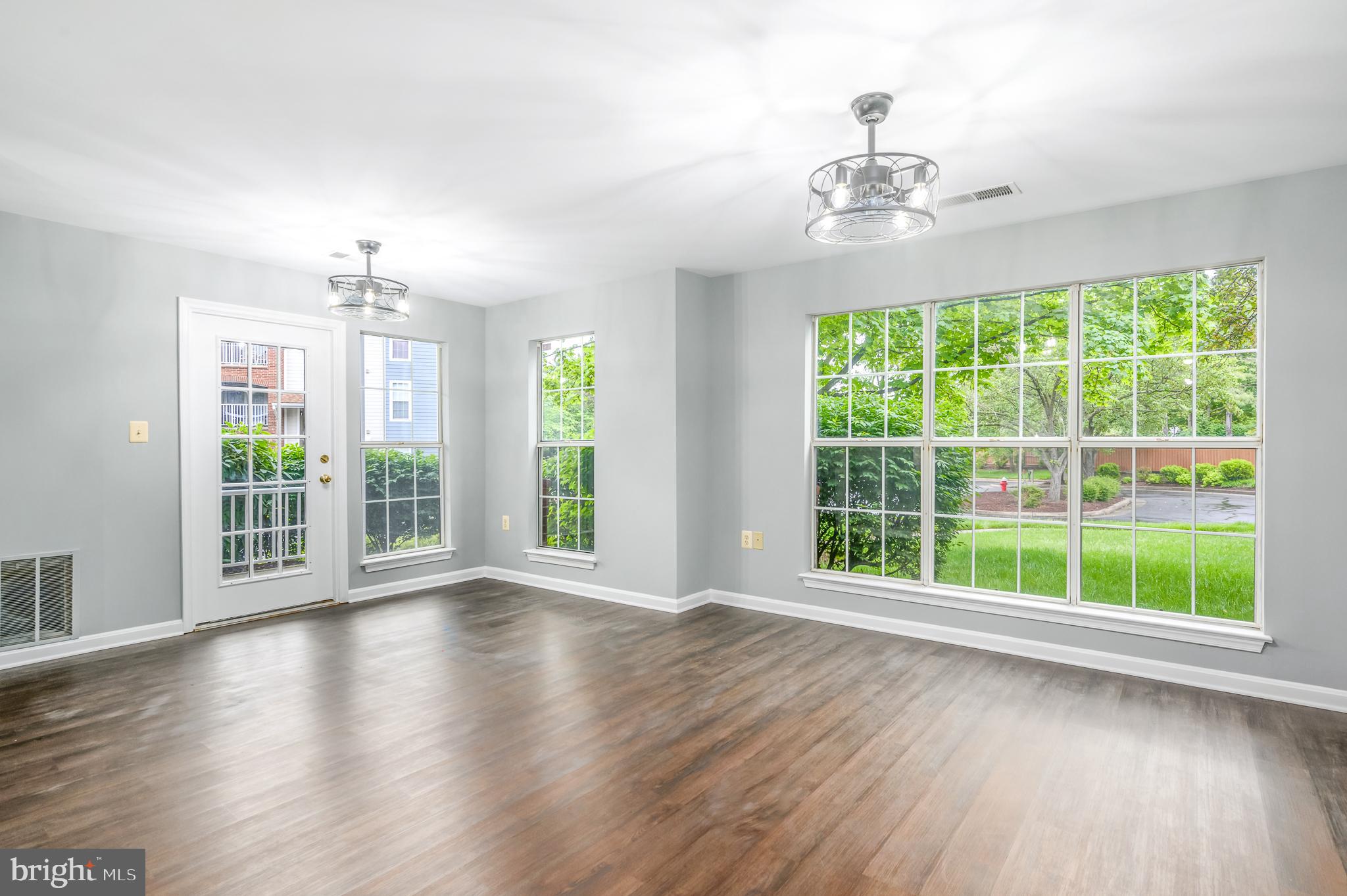 21012 Timber Ridge Terrace, Unit 101 Ashburn, VA 20147 - Photo 4 of 29 Living Room / Dining Room