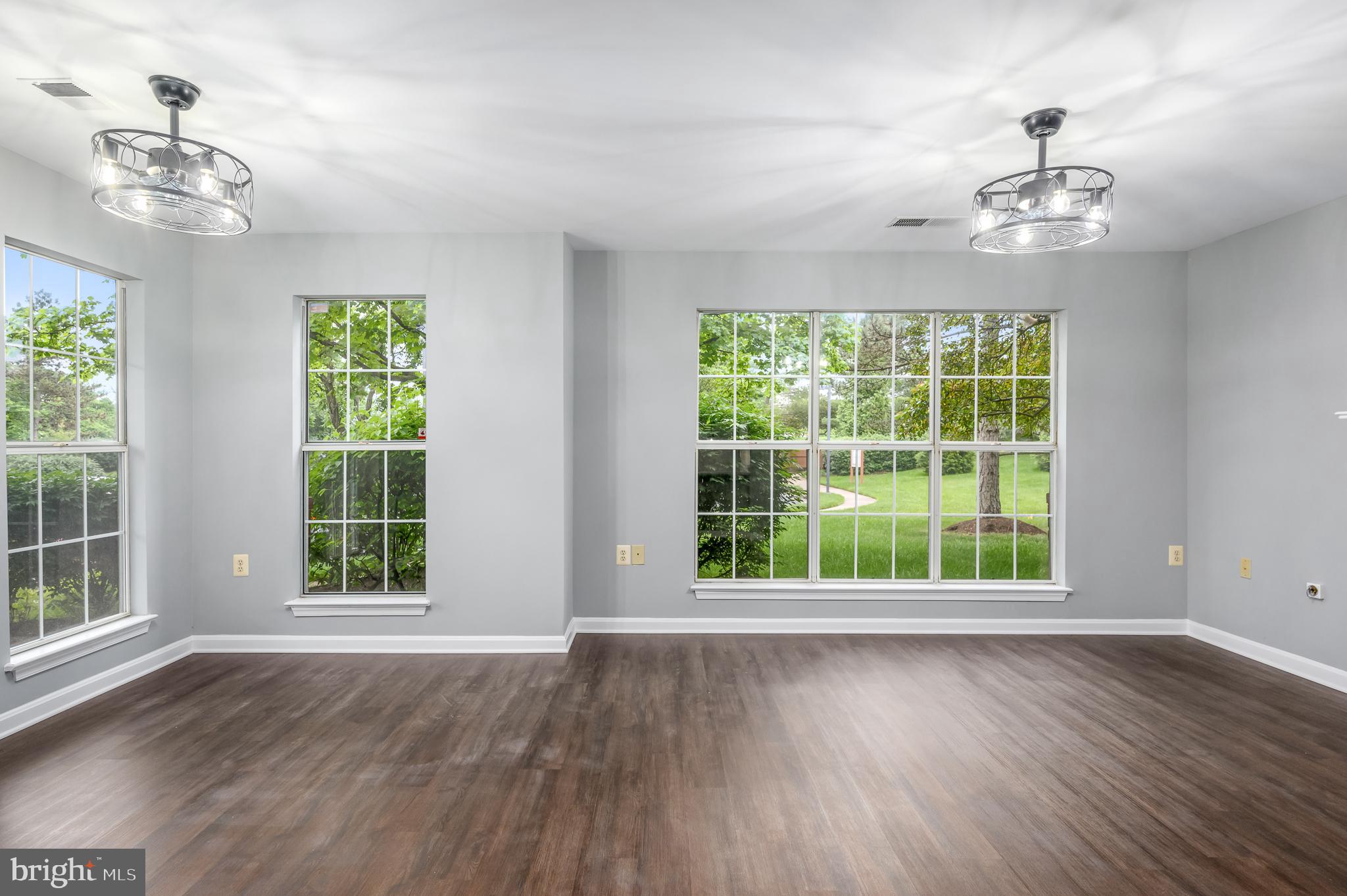 21012 Timber Ridge Terrace, Unit 101 Ashburn, VA 20147 - Photo 6 of 29 Living Room / Dining Room