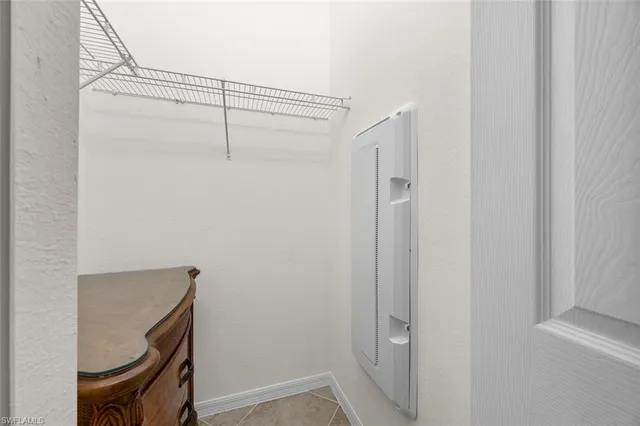 a bathroom with a shower and a shower