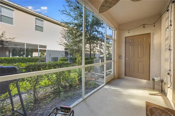 a view of balcony with furniture