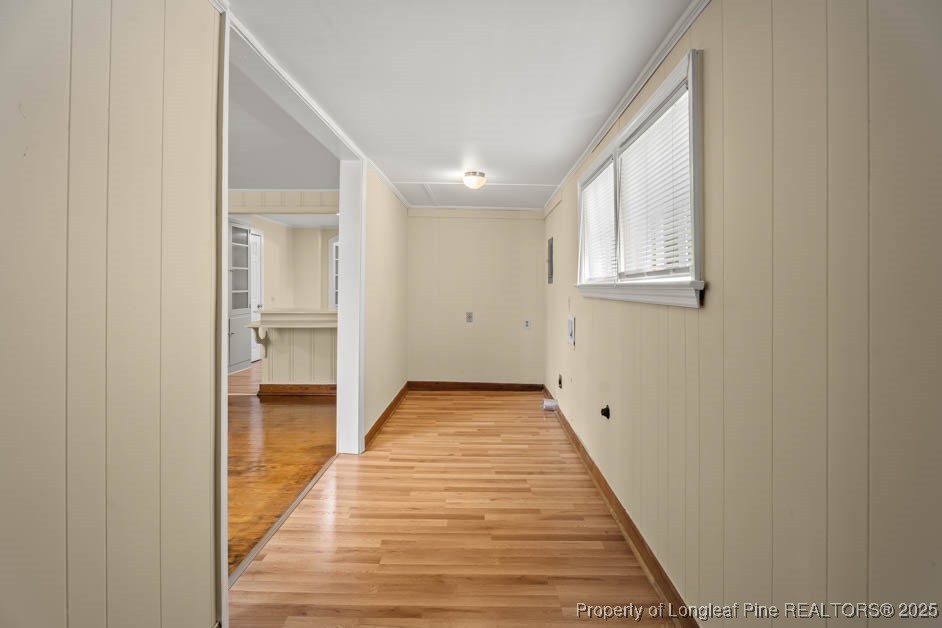 1007 Jenkins Street Lumberton, NC 28358 - Photo 22 of 44 a view of a hallway with wooden floor and closet