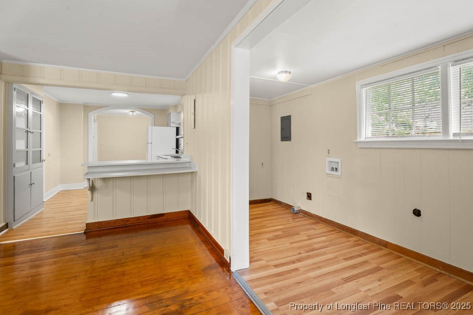 1007 Jenkins Street Lumberton, NC 28358 - Photo 24 of 44 a view of an empty room with wooden floor and a window
