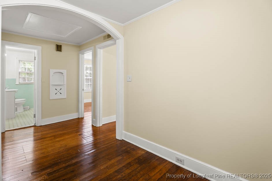 1007 Jenkins Street Lumberton, NC 28358 - Photo 10 of 44 a view of an empty room with wooden floor