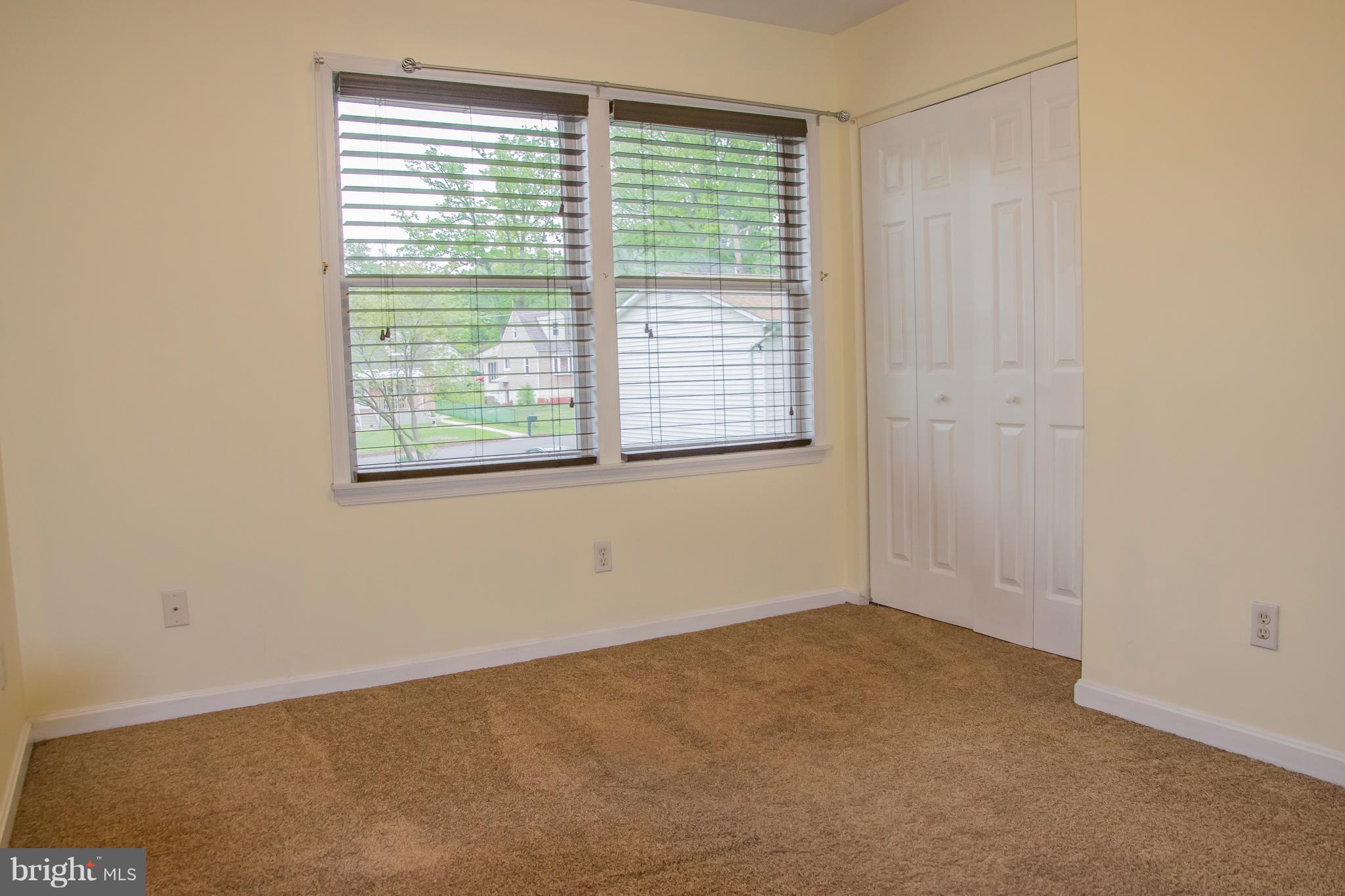 1403 Spring Avenue Baltimore, MD 21237 - Photo 17 of 28 a view of an empty room with a window