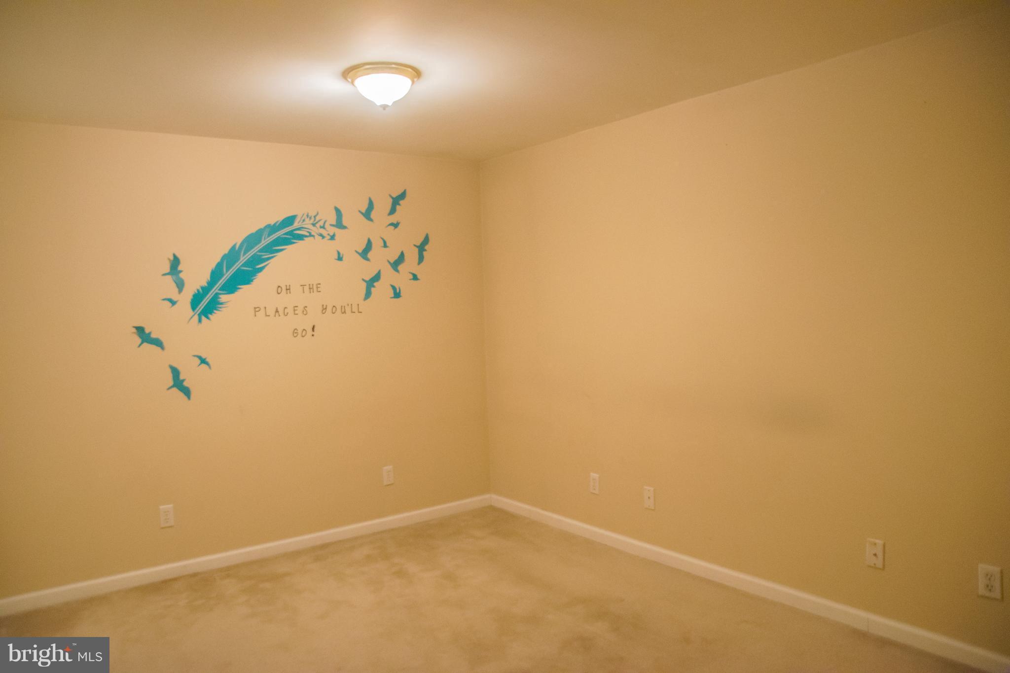 1403 Spring Avenue Baltimore, MD 21237 - Photo 19 of 28 a view of small space with racks on the wall