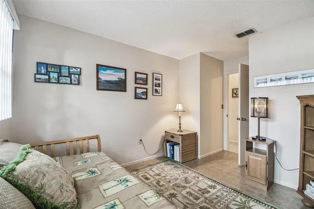 a bathroom with a double vanity sink toilet mirror and shower