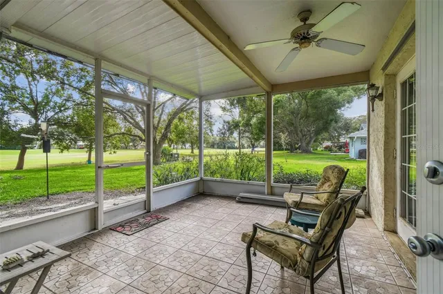 a front view of a house with yard and green space