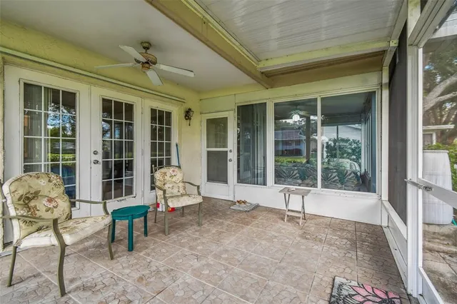 a view of a house with a tree
