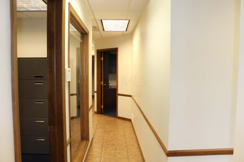 1900 Bethel Road Columbus, OH 43235 - Photo 16 of 24 Ceramic tile flooring. Ivory painted walls. Suspended ceiling. Fluorescent lighting. Chair railing.