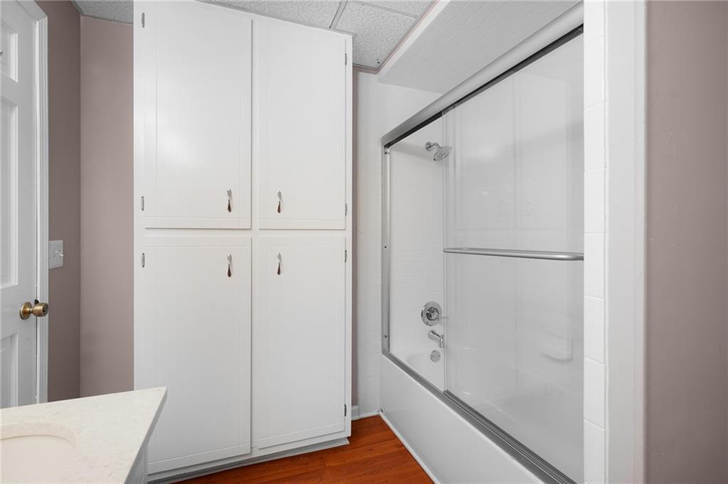 127 Windsor Drive Calhoun, GA 30701 - Photo 36 of 57 a bathroom with a bathtub and a shower