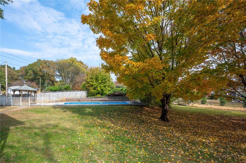127 Windsor Drive Calhoun, GA 30701 - Photo 47 of 57 a view of swimming pool with a yard