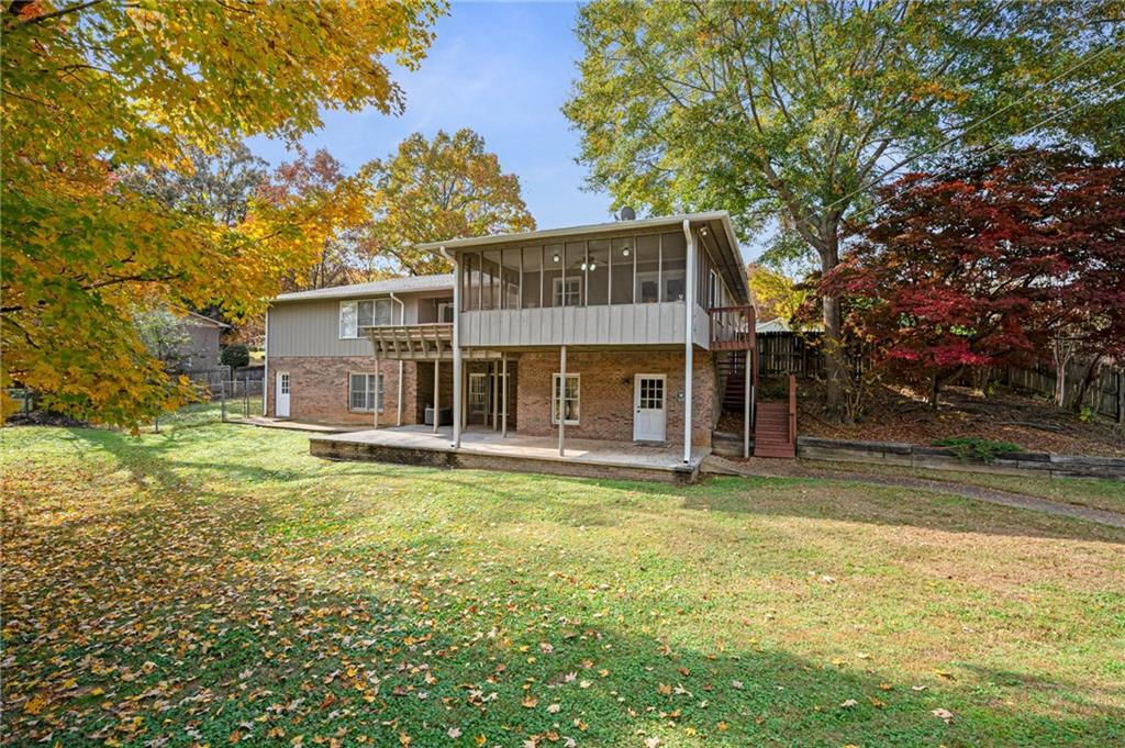 127 Windsor Drive Calhoun, GA 30701 - Photo 49 of 57 a view of a house with a yard balcony and tree s