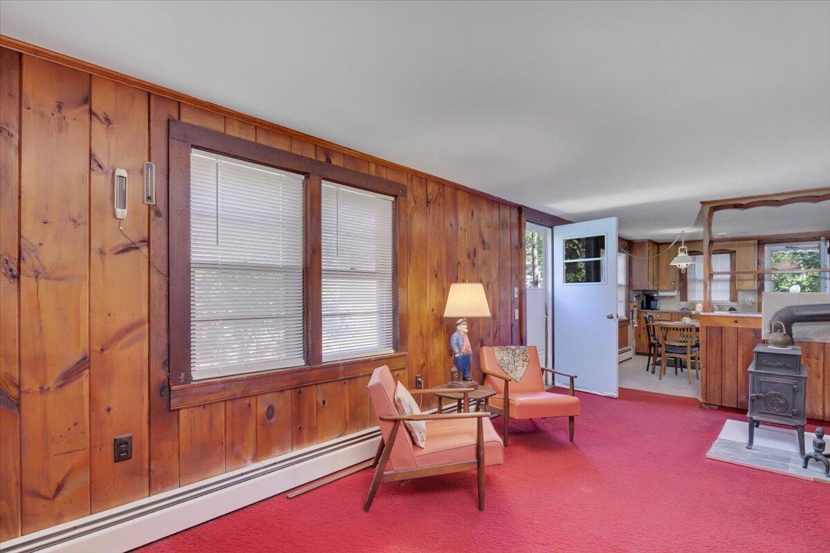 5 Indian Neck Road Wellfleet, MA 02667 - Photo 14 of 24 a living room with furniture and large windows
