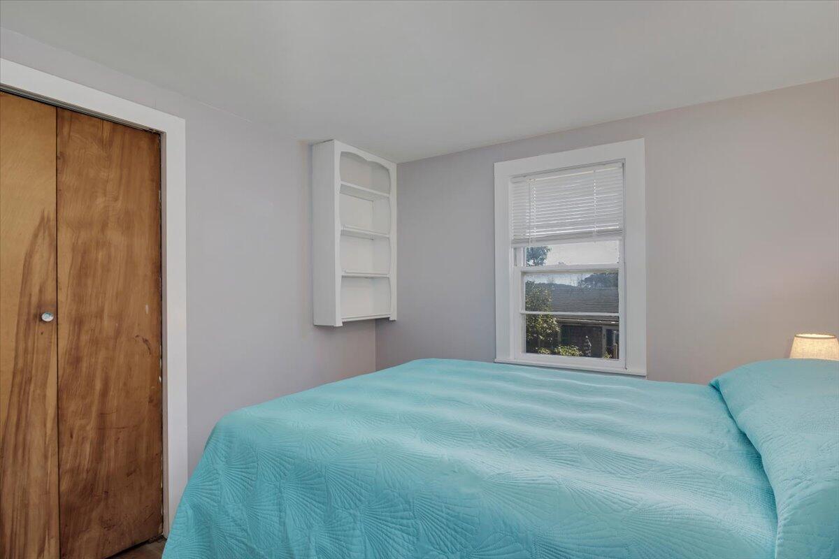 5 Indian Neck Road Wellfleet, MA 02667 - Photo 19 of 24 a bedroom with a bed and a window