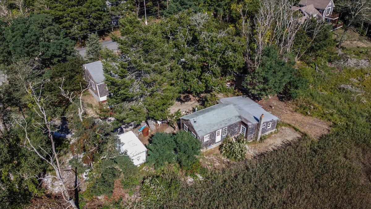 5 Indian Neck Road Wellfleet, MA 02667 - Photo 20 of 24 an aerial view of residential house with outdoor space and trees all around