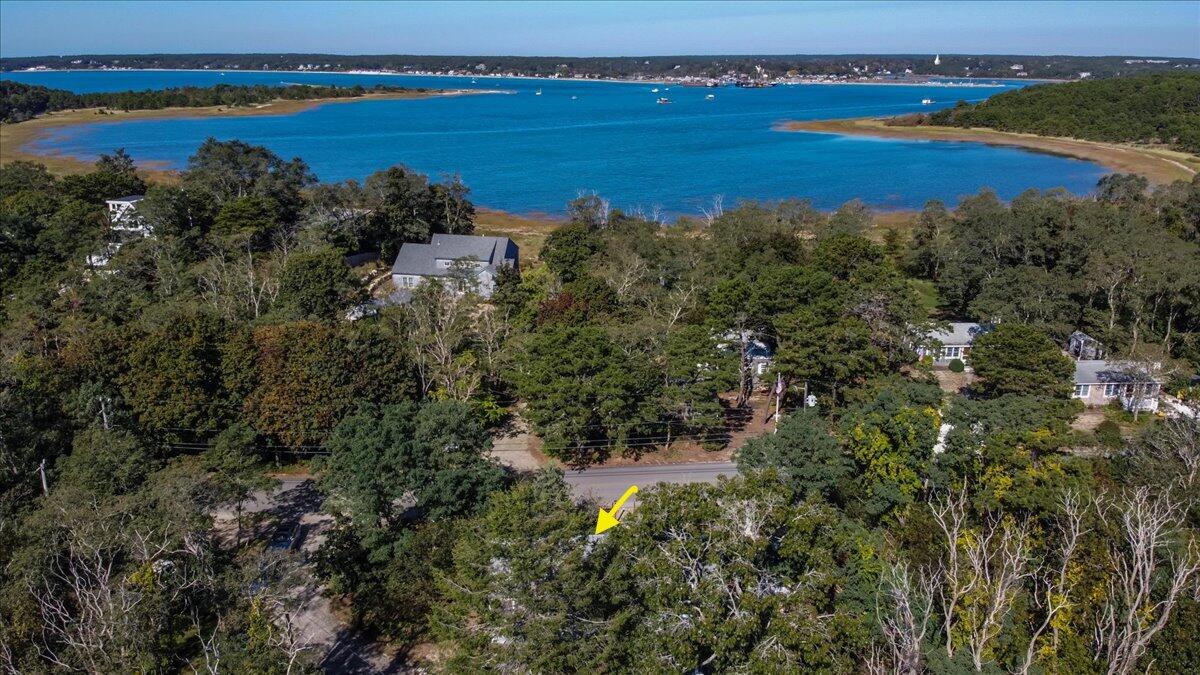 5 Indian Neck Road Wellfleet, MA 02667 - Photo 4 of 24 an aerial view of ocean and residential houses with outdoor space and lake view