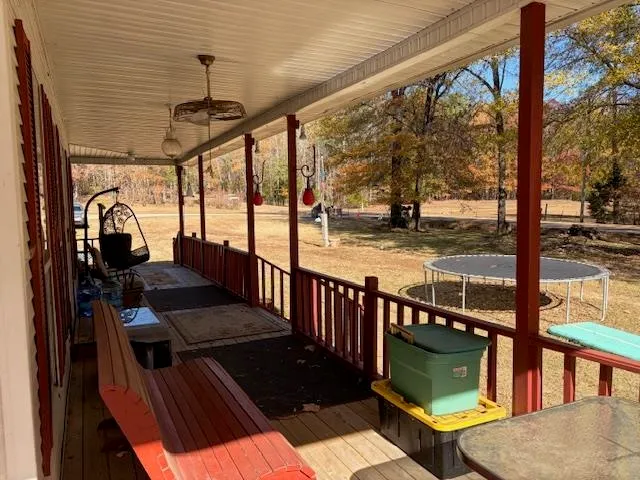a view of a porch with furniture