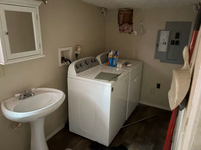 a utility room with dryer and washer